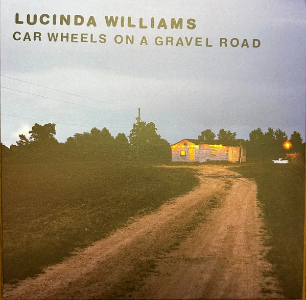 Copertina di Car Wheels On A Gravel Road