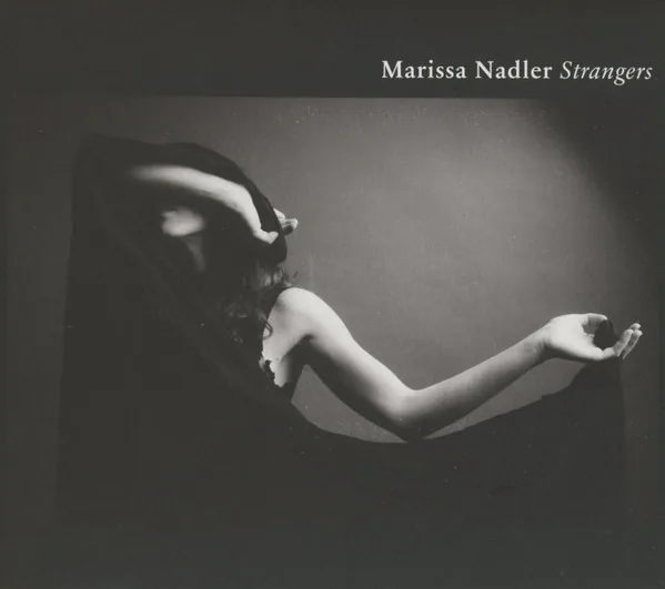 Copertina di Strangers